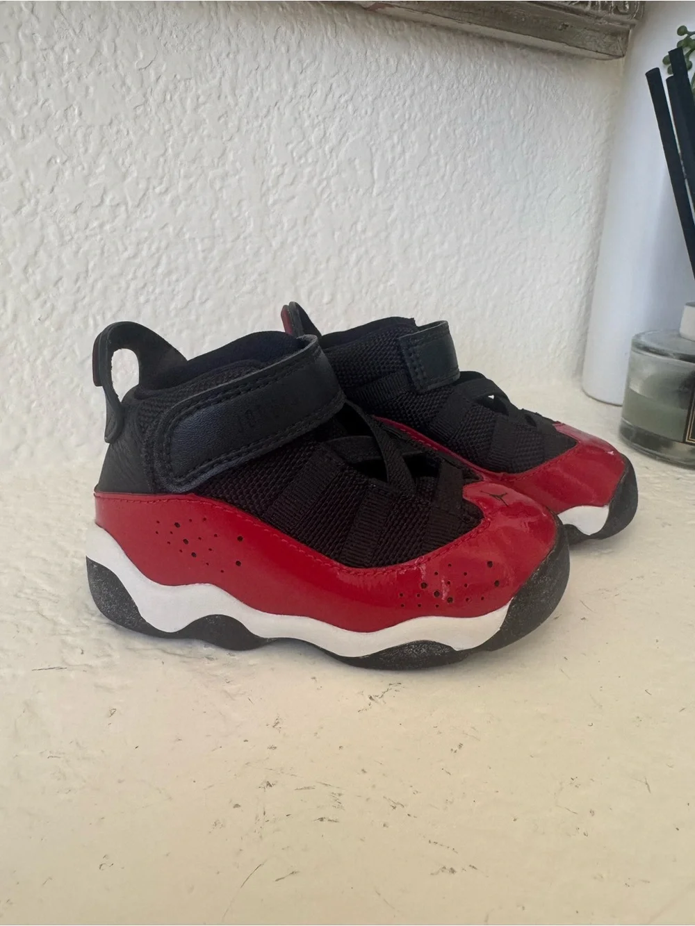 Kids Jordan Black and Red Basketball Sneakers